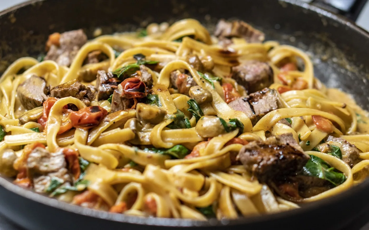 Piatto di pasta, immagine rappresentativa del pranzo